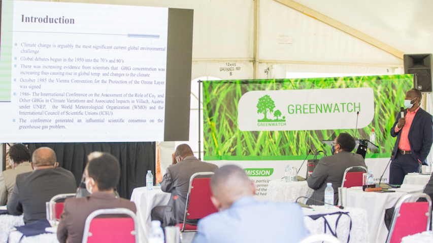 Dr. Patrick Byakagaba (standing) presents before judges on the evolution of climate legislation in Uganda